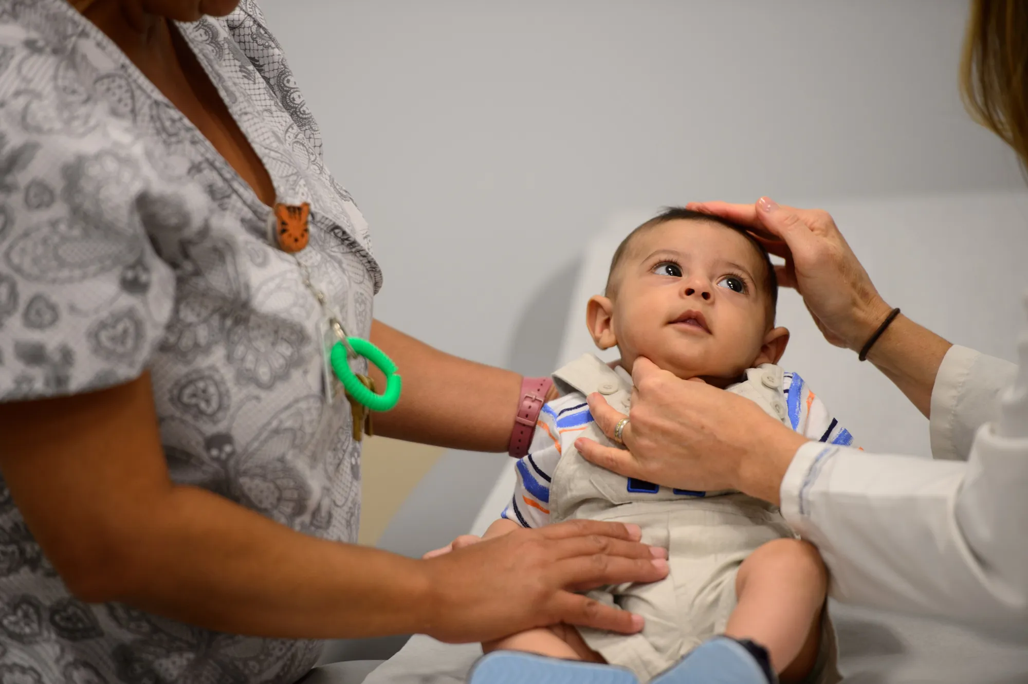 A baby being examined during a doctor's visit