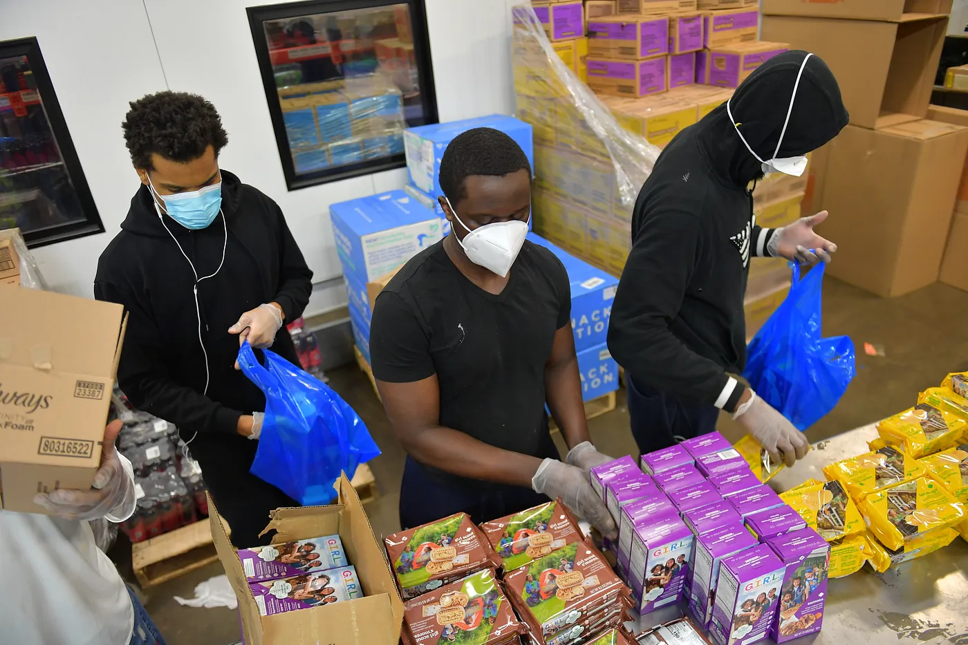 People sort through food donations